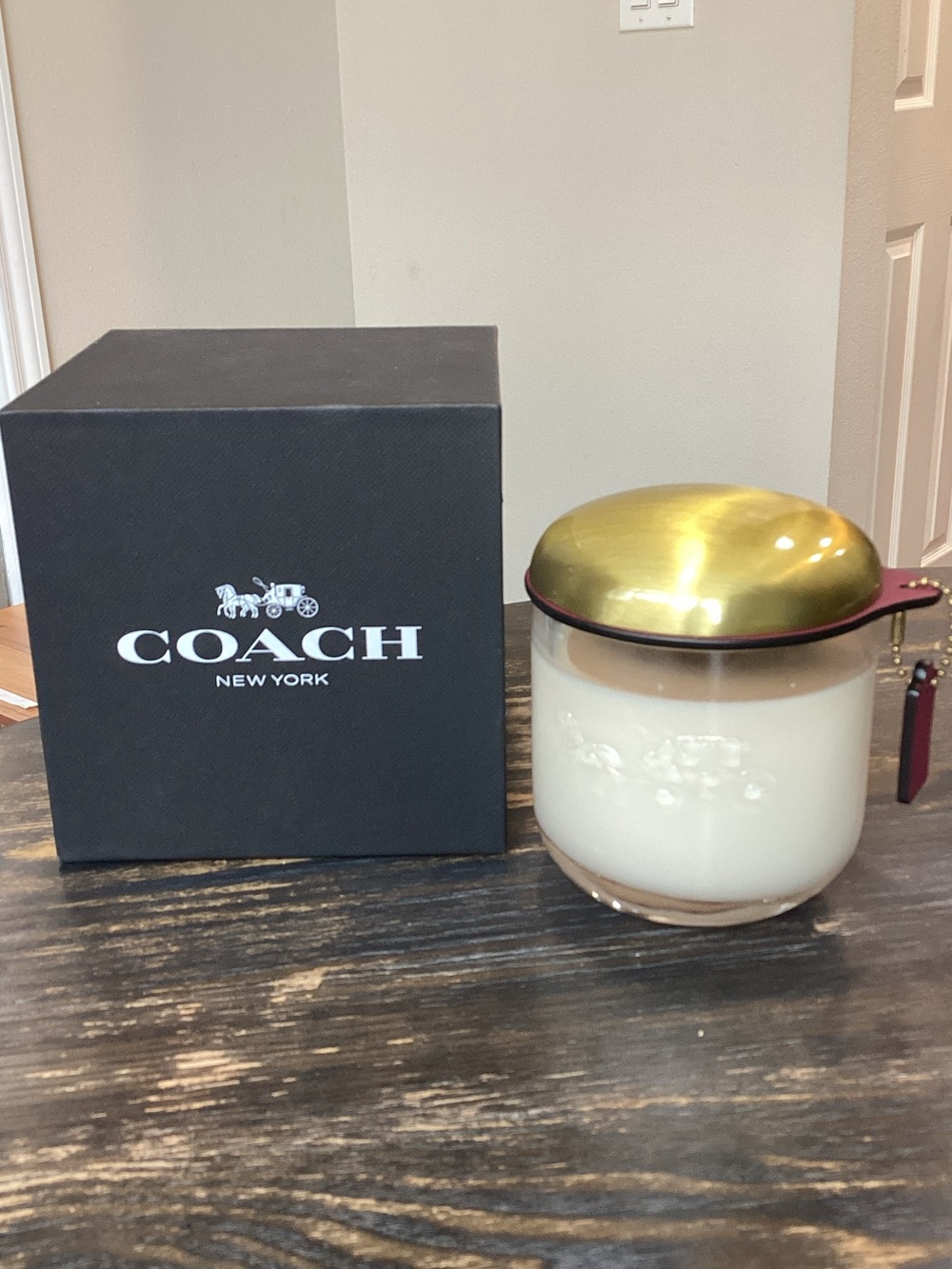 Coach White Soy Candle with Gold Lid, red hang tag and Black Box